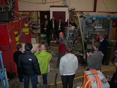 Laboratory manager Brian Asbury (center) gives a tour of the Earth Mechanics Institute.